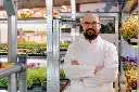 gardener-in-glasses-and-white-coat-at-microgreen-f-2024-11-27-14-27-25-utc.webp